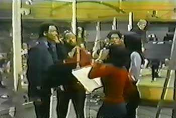 The 5th Dimension singing at the recording studio